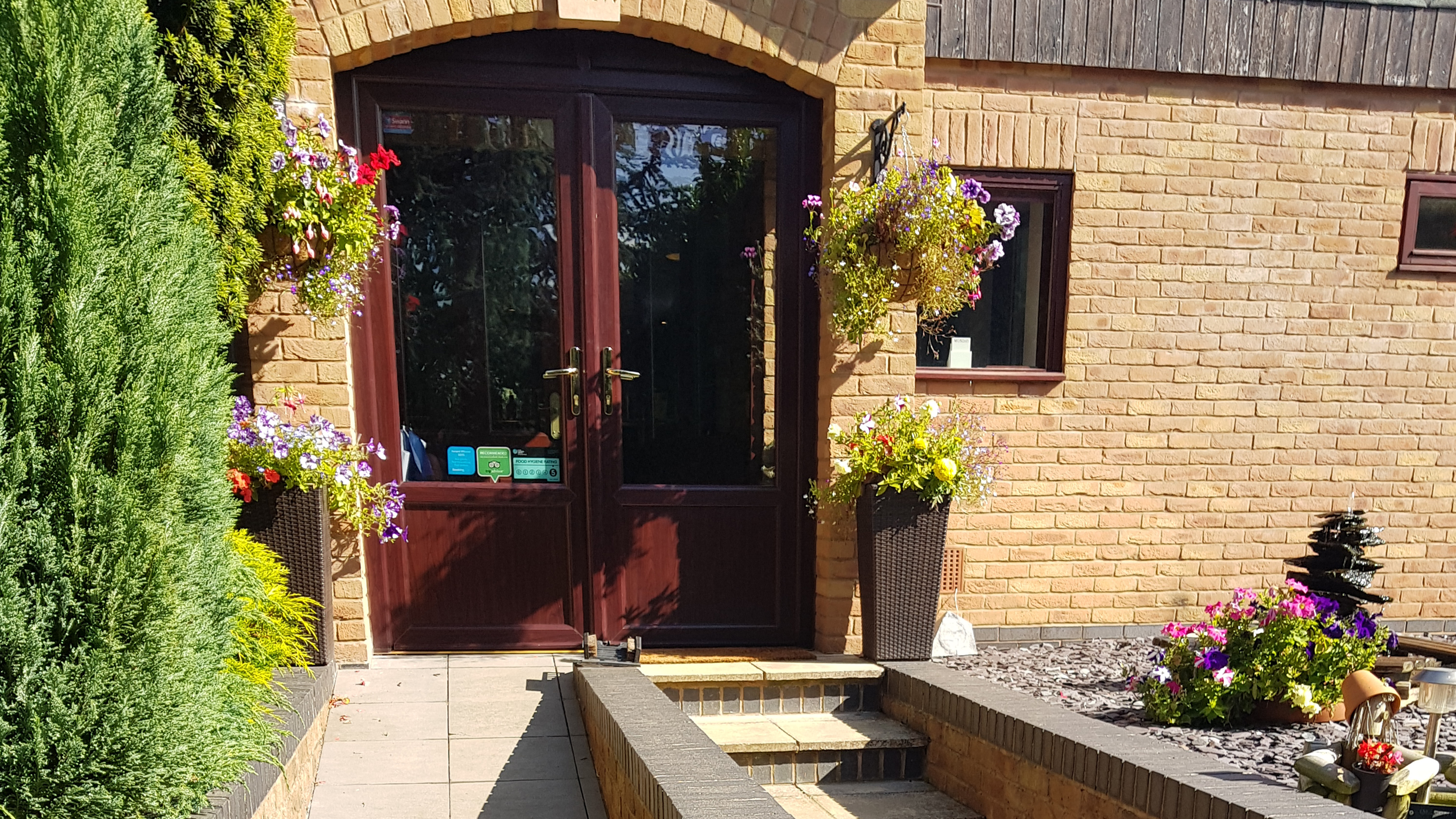 Front Entrance with Flowers Samsung Phone Changed Ratio